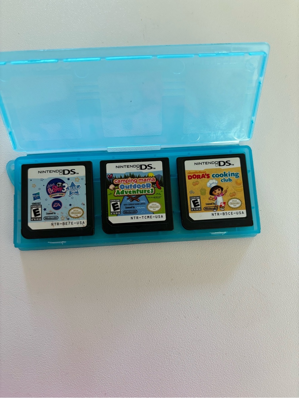 Nintendo DS Games - littles pet shop, camping mama, Dora’s cooking club